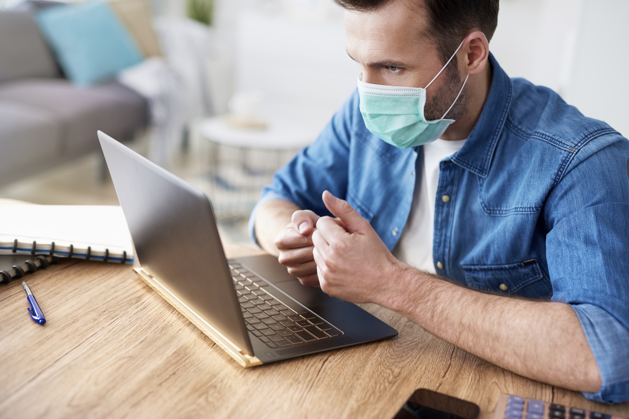 Man working home while coronavirus pandemic