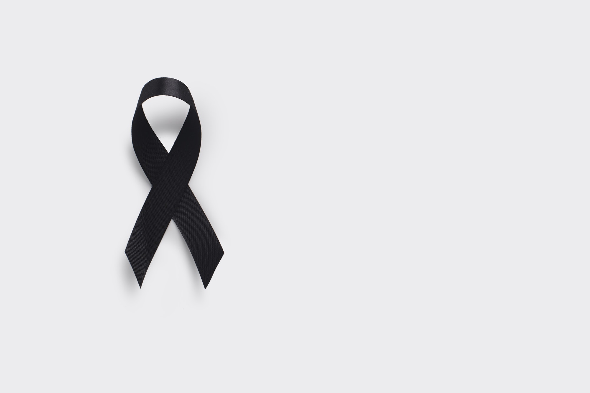 Melanoma and skin cancer awareness ribbon. Realistic Black Ribbon