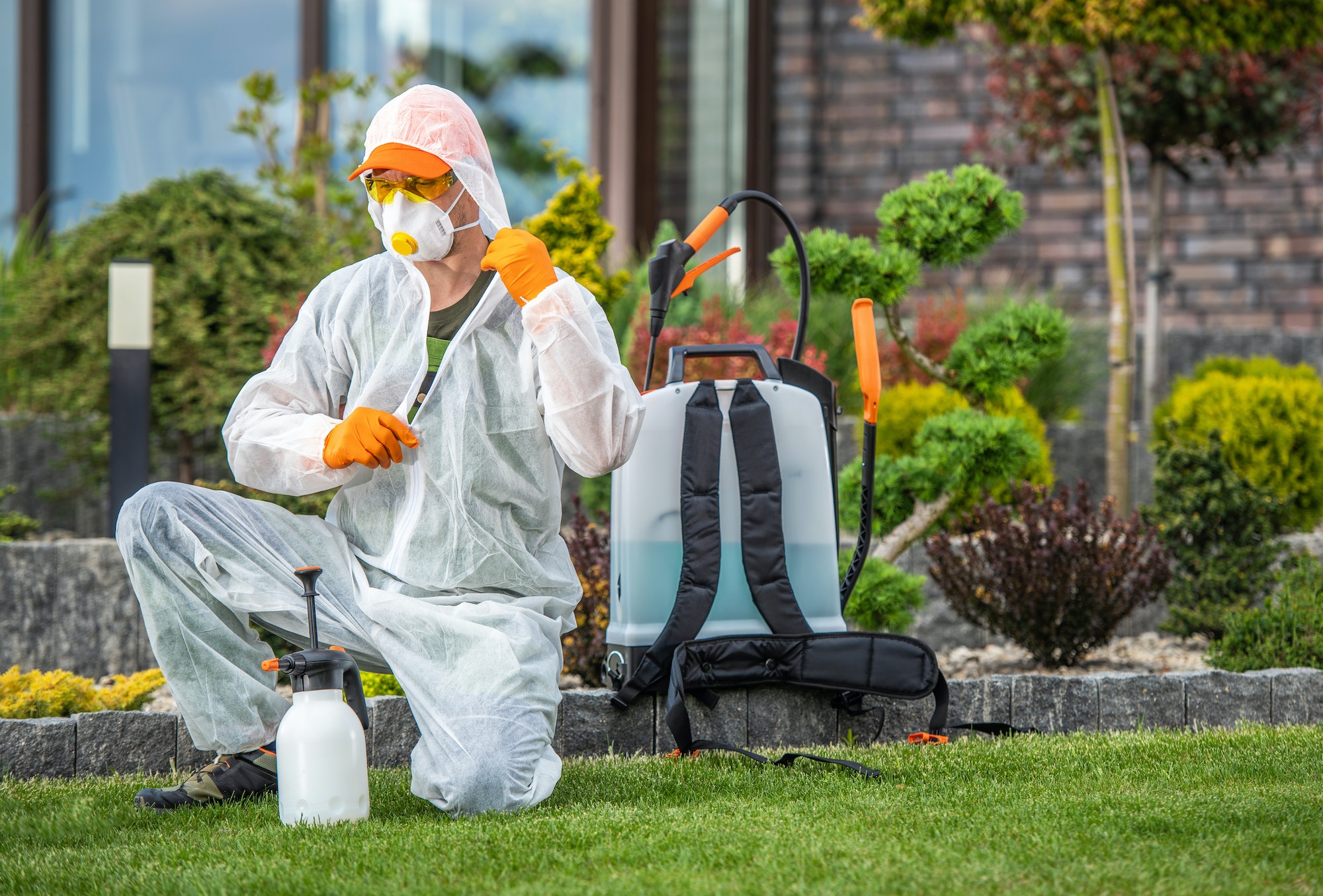 Gardener Preparing To Insecticide Garden Plants